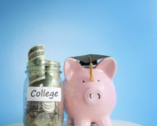 Jar with money labeled college next to a piggy bank with a graduation cap on it representing the GI Bill