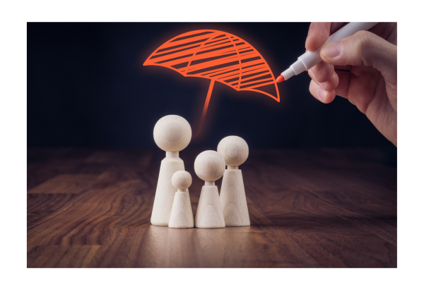Desk with figures of a family of four with an umbrella drawn over them signify the protection the SBP decision can provide.