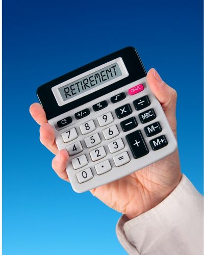 Image of a hand holding a calculator that says RETIREMENT identifiying YOUR Retirement Number